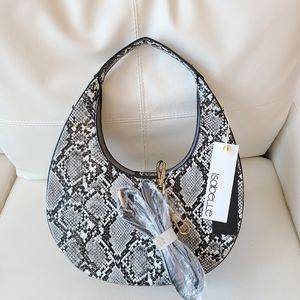 Isabelle - NWT - PETA approved Vegan snake print purse